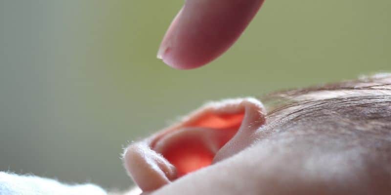 Touching a babies ear